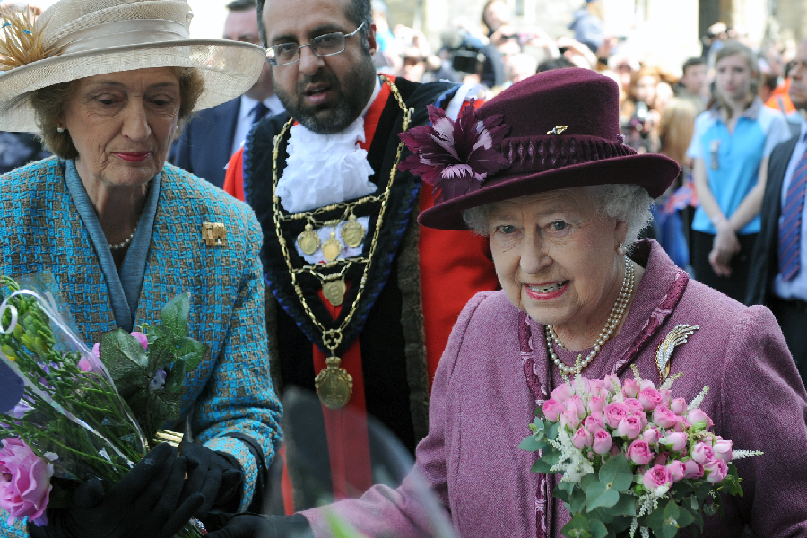 Queen Elizabeth ll, accompanied by her lady-in-waiting, Lady Susan Hussey undertakes a walkabout to mark her Diamond Jubilee on April 30, 2012 in Windsor, England