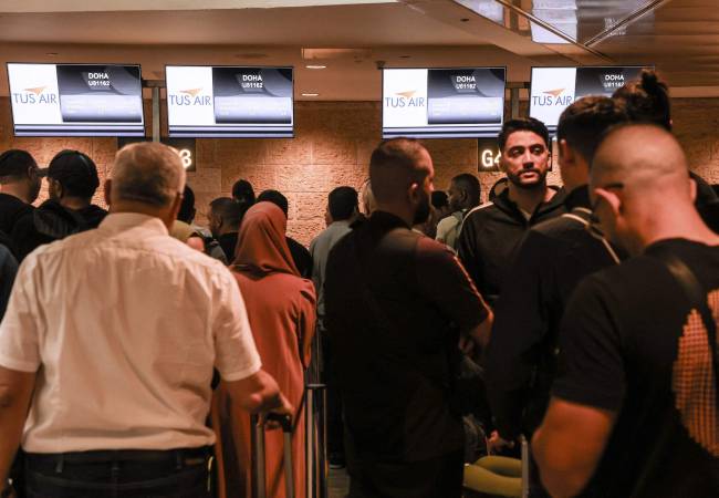 Torcedores em um aeroporto de Israel no mês passado para viagens ao Catar -