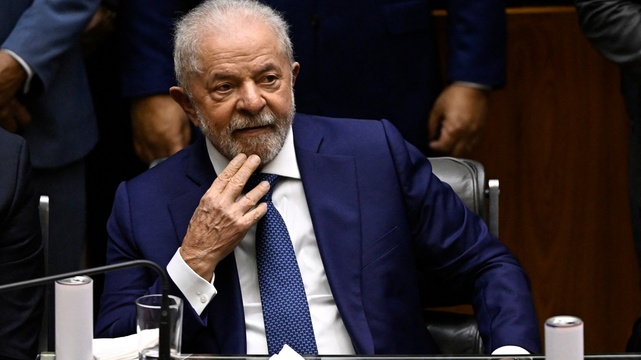Brazil's President-elect Luiz Inacio Lula da Silva looks on during his inauguration ceremony at the National Congress, in Brasilia, on January 1, 2023. - Lula da Silva, a 77-year-old leftist who already served as president of Brazil from 2003 to 2010, takes office for the third time with a grand inauguration in Brasilia. (Photo by MAURO PIMENTEL / AFP)