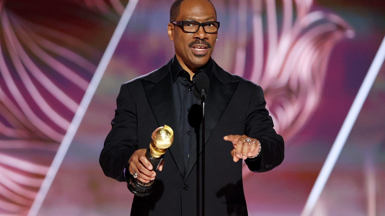 BEVERLY HILLS, CALIFORNIA - JANUARY 10: 80th Annual GOLDEN GLOBE AWARDS -- Pictured: Honoree Eddie Murphy accepts the Cecil B. DeMille Award onstage at the 80th Annual Golden Globe Awards held at the Beverly Hilton Hotel on January 10, 2023 in Beverly Hills, California. -- (Photo by Rich Polk/NBC via Getty Images)