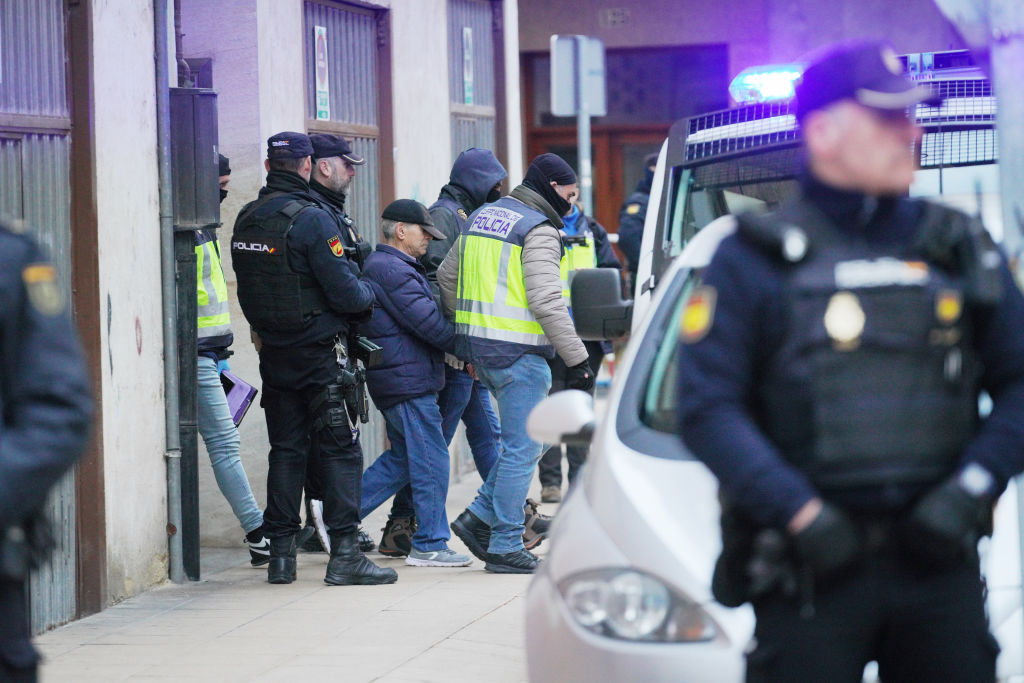BURGOS, CASTILLA Y LEON, SPAIN - JANUARY 25: Agents of the National Police take the man arrested, wearing a cap, for his alleged connection with the sending of explosive letters to different institutions, on 25 January, 2023 in Miranda de Ebro, Burgos, Castilla y Leon, Spain. The National Police has arrested a man in the town of Miranda de Ebro, Burgos, for his alleged connection with the sending of explosive letters that last November were sent to the President of the Government and other organizations. The services of the Security Department of the Presidency of the Government detected the letter while sifting and filtering the correspondence. (Photo By Iñaki Berasaluce/Europa Press via Getty Images)