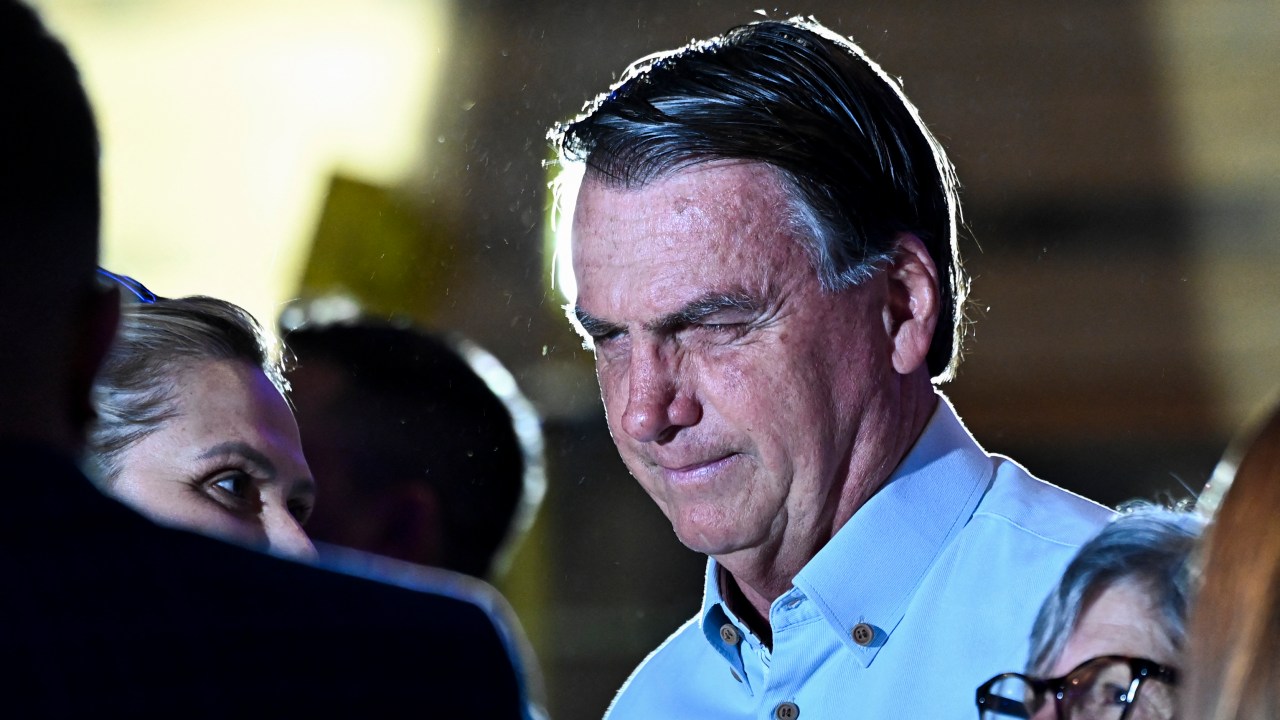 Former President of Brazil Jair Bolsonaro arrive to speak during a news conference at Dezerland Park in Orlando, Florida, on January 31, 2023. (Photo by CHANDAN KHANNA / AFP)