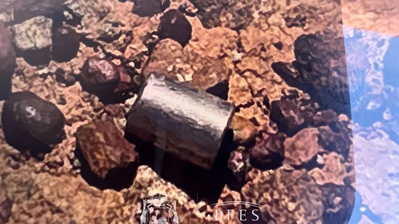 This handout from the Government of Western Australia's Department of Fire and Emergency Services taken and received on February 1, 2023 shows a radioactive capsule, which had fallen off a truck, after it was found along a desert highway south of Newman, Western Australia. - A tiny but dangerously radioactive capsule, which fell off a truck along a remote stretch of Outback highway in Western Australia last month, was found on February 1, authorities said. (Photo by Handout / various sources / AFP) / -----EDITORS NOTE --- RESTRICTED TO EDITORIAL USE - MANDATORY CREDIT "AFP PHOTO / GOVERNMENT OF WESTERN AUSTRALIA / DEPARTMENT OF FIRE AND EMERGENCY SERVICES " - NO MARKETING - NO ADVERTISING CAMPAIGNS - DISTRIBUTED AS A SERVICE TO CLIENTS