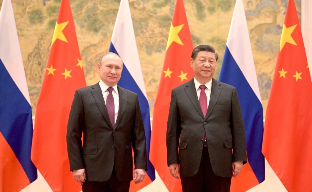 BEIJING, CHINA â FEBRUARY 4: (---EDITORIAL USE ONLY - MANDATORY CREDIT - "KREMLIN PRESS OFFICE / HANDOUT" - NO MARKETING NO ADVERTISING CAMPAIGNS - DISTRIBUTED AS A SERVICE TO CLIENTS----) Russian President Vladimir Putin (L) and Chinese President Xi Jinping (R) meet in Beijing, China on February 4, 2022. (Photo by Kremlin Press Office/Handout/Anadolu Agency via Getty Images)