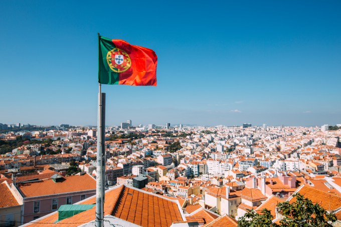 Portuguese flag and Lisbon skyline, Portugal