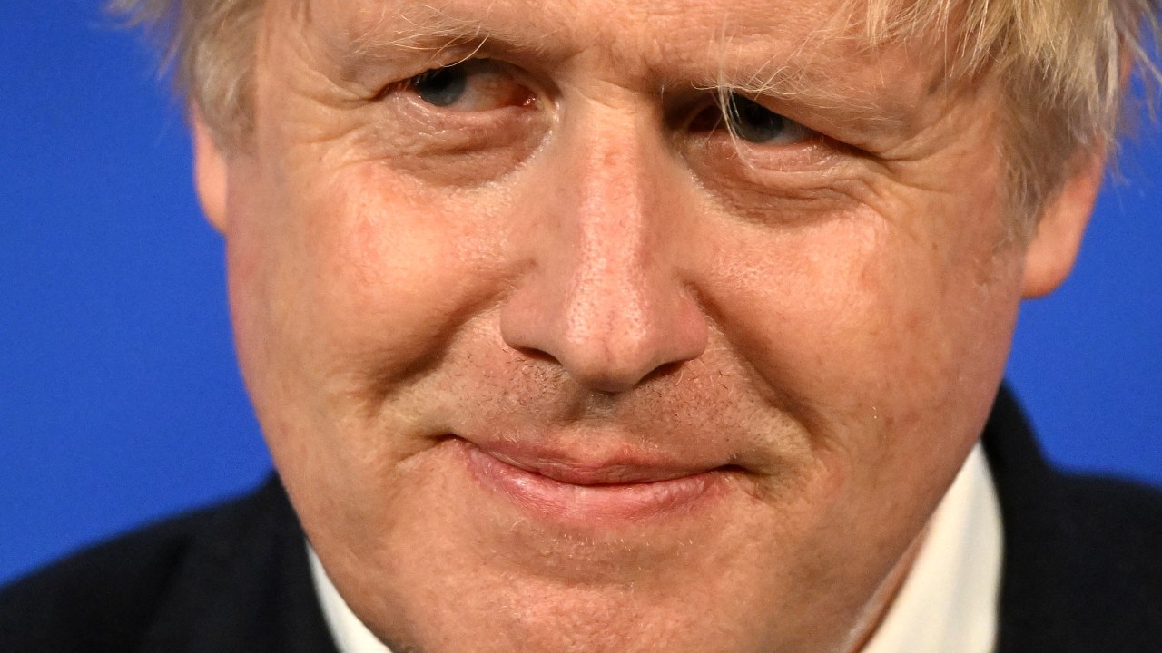 (FILES) In this file photo taken on May 25, 2022 Britain's Prime Minister Boris Johnson attends a press conference in the Downing Street Briefing Room in central London, following the publication of the Sue Gray report. - UK lawmakers announced on March 3, 2023, they will question former prime minister Boris Johnson over whether he lied about "Partygate", in a probe that could trigger his removal as a member of parliament. In an interim report released after eight months of work, parliament's "privileges" committee said the evidence so far undermined Johnson's pleas of innocence to the House of Commons. (Photo by Leon Neal / POOL / AFP)