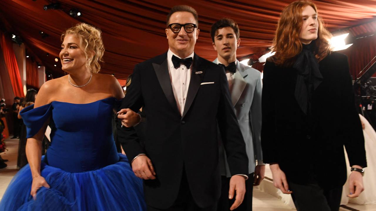 US actor Brendan Fraser (2L) attends the 95th Annual Academy Awards at the Dolby Theatre in Hollywood, California on March 12, 2023. (Photo by VALERIE MACON / AFP)
