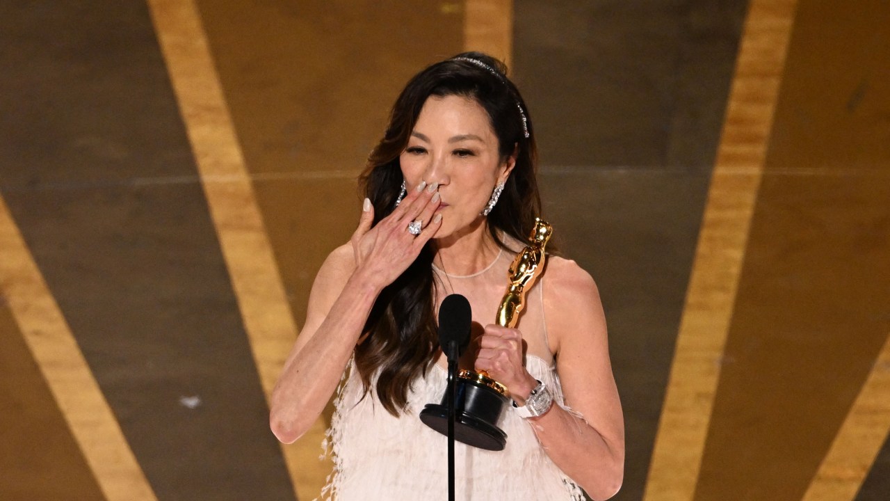 Malaysian actress Michelle Yeoh accepts the Oscar for Best Actress in a Leading Role for "Everything Everywhere All at Once" onstage during the 95th Annual Academy Awards at the Dolby Theatre in Hollywood, California on March 12, 2023. (Photo by Patrick T. Fallon / AFP)