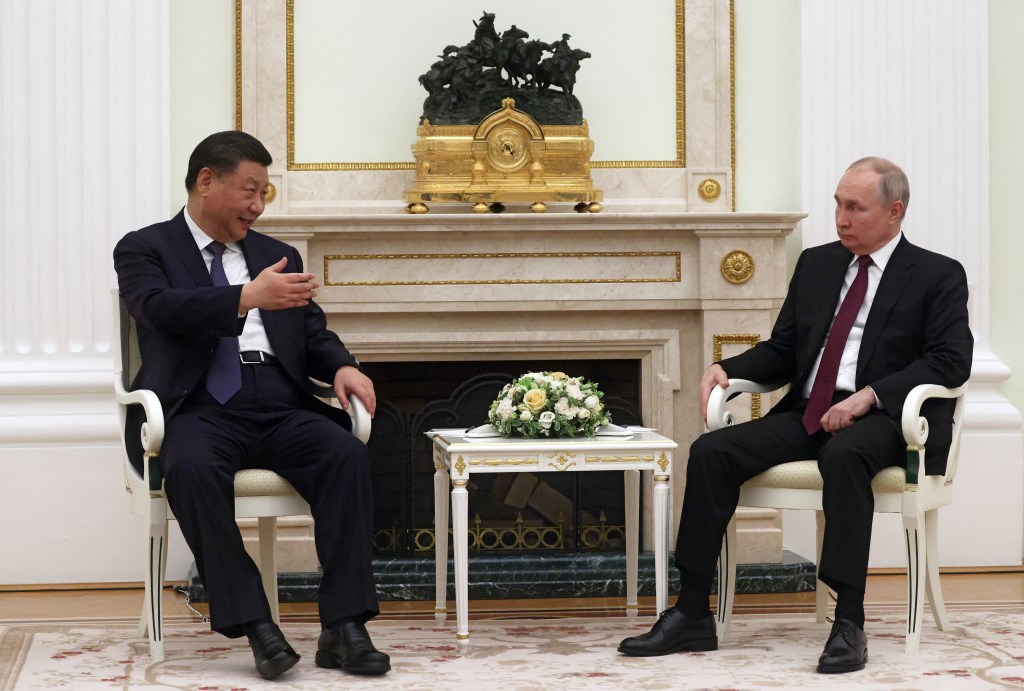Russian President Vladimir Putin meets with China's President Xi Jinping at the Kremlin in Moscow on March 20, 2023. (Photo by Sergei KARPUKHIN / SPUTNIK / AFP)