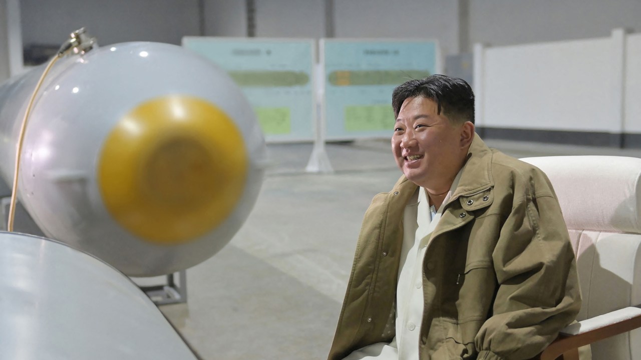 This undated picture taken from the period of March 21 to 23, 2023 and released by North Korea's official Korean Central News Agency (KCNA) on March 24, 2023 shows North Korean leader Kim Jong Un inspecting the underwater nuclear strategic attack weapon system "Haeil" at an undisclosed place in North Korea. (Photo by KCNA VIA KNS / AFP) / South Korea OUT / ---EDITORS NOTE--- RESTRICTED TO EDITORIAL USE - MANDATORY CREDIT "AFP PHOTO/KCNA VIA KNS" - NO MARKETING NO ADVERTISING CAMPAIGNS - DISTRIBUTED AS A SERVICE TO CLIENTS / THIS PICTURE WAS MADE AVAILABLE BY A THIRD PARTY. AFP CAN NOT INDEPENDENTLY VERIFY THE AUTHENTICITY, LOCATION, DATE AND CONTENT OF THIS IMAGE --- /
