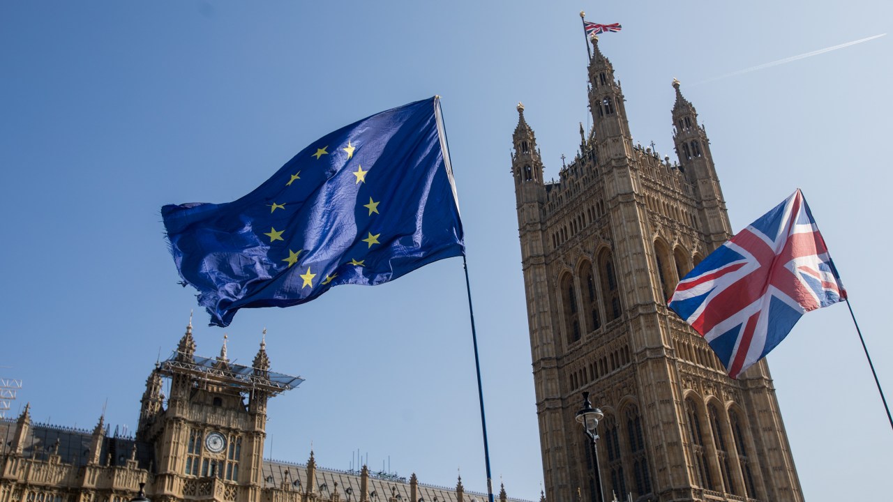A European Union (EU) flies alongside a British Union flag, also known as a Union Jack in London. Photographer: Jason Alden/Bloomberg
