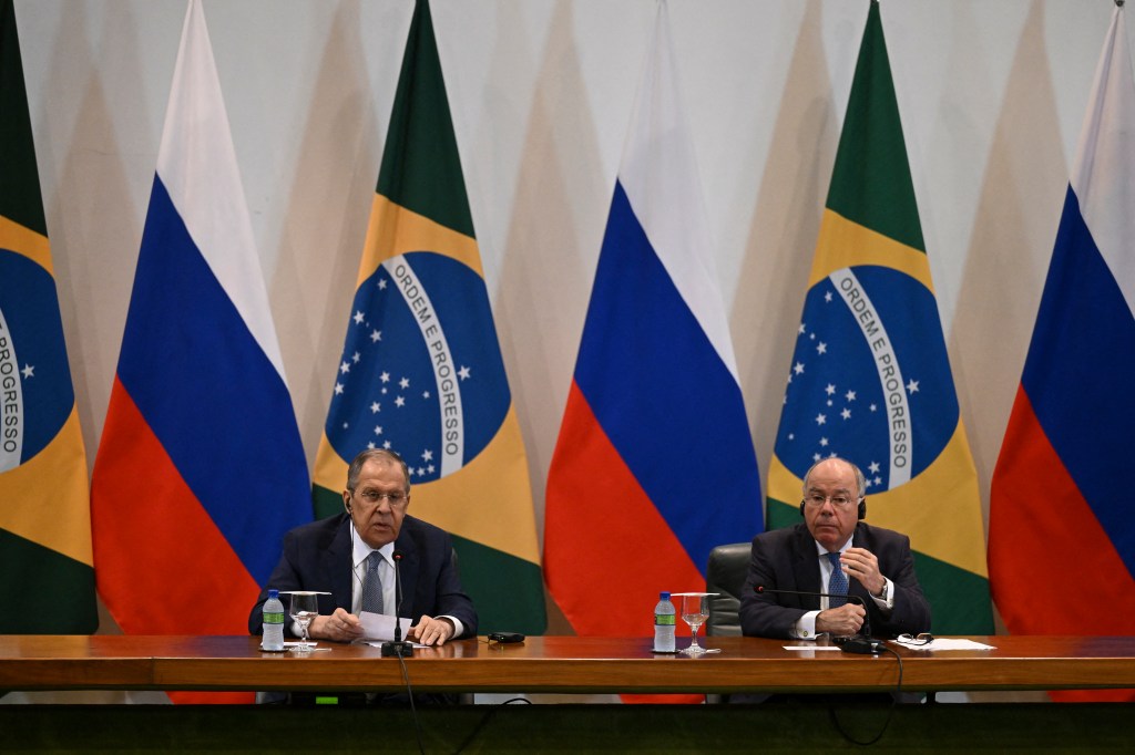 Russian Foreign Minister Sergey Lavrov (L) speaks during a joint press conference with his Brazilian counterpart Mauro Vieira (R) at Itamaraty Palace in Brasilia on April 17, 2023. (Photo by EVARISTO SA / AFP)