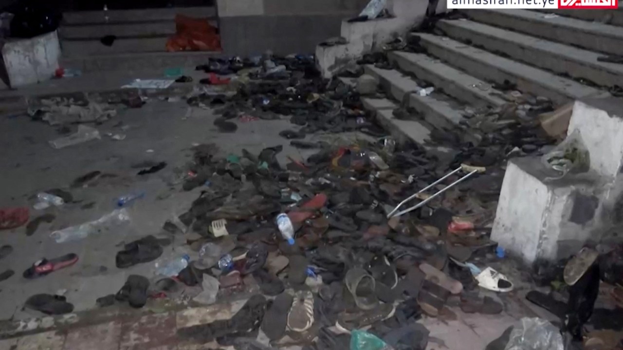 EDITORS NOTE: Graphic content / This screengrab obtained on April 20, 2023 from Al-Masirah TV video footage taken on April 19, shows shoes scattered on the steps of a charity distribution centre following an overnight stampede in Sanaa. - More than 80 people were killed and hundreds injured in a crush at a charity distribution event in war-torn Yemen overnight, Huthi officials said, one of the deadliest stampedes in a decade. (Photo by AL-MASIRAH TV / AFP) / -----EDITORS NOTE --- RESTRICTED TO EDITORIAL USE - MANDATORY CREDIT "AFP PHOTO / AL-MASIRAH TV " - NO MARKETING - NO ADVERTISING CAMPAIGNS - DISTRIBUTED AS A SERVICE TO CLIENTS
