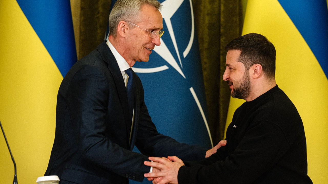 NATO head Jens Stoltenberg (L) shakes hands with Ukrainian President Volodymyr Zelensky at the end of a joint press conference in Kyiv, on April 20, 2023, amid the Russian invasion of Ukraine. - Stoltenberg on April 20, said the Western military alliance would "ensure that Ukraine prevails" against Russia but did not hold out any immediate prospect of alliance membership. (Photo by Dimitar DILKOFF / AFP)