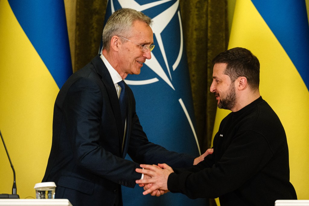 NATO head Jens Stoltenberg (L) shakes hands with Ukrainian President Volodymyr Zelensky at the end of a joint press conference in Kyiv, on April 20, 2023, amid the Russian invasion of Ukraine. - Stoltenberg on April 20, said the Western military alliance would "ensure that Ukraine prevails" against Russia but did not hold out any immediate prospect of alliance membership. (Photo by Dimitar DILKOFF / AFP)