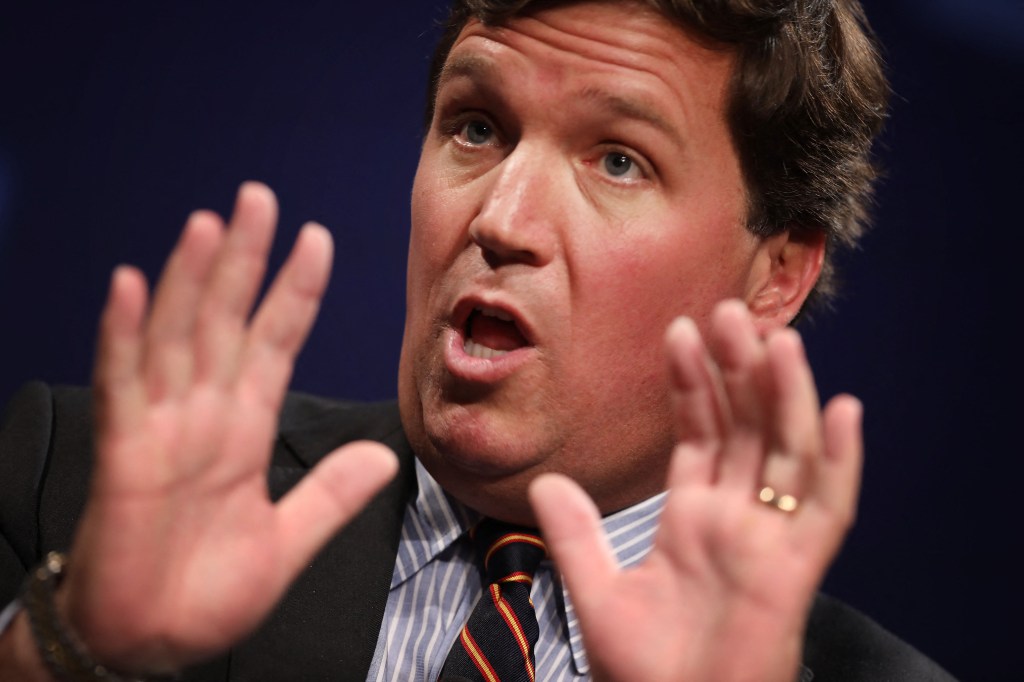 (FILES) In this file photo taken on March 28, 2019 Fox News host Tucker Carlson discusses 'Populism and the Right' during the National Review Institute's Ideas Summit at the Mandarin Oriental Hotel in Washington, DC. - Fox News star host Tucker Carlson is leaving the influential TV network, it was announced April 24, 2023, in a shock move days after the conservative outlet reached a $787.5 million settlement over a damaging defamation case. (Photo by CHIP SOMODEVILLA / GETTY IMAGES NORTH AMERICA / AFP)