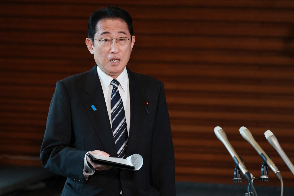 Japan's Prime Minister Fumio Kishida answers questions from reporters after North Korea announced it would launch a satellite, at the prime minister's office in Tokyo on May 29, 2023. (Photo by JIJI Press / AFP) / Japan OUT