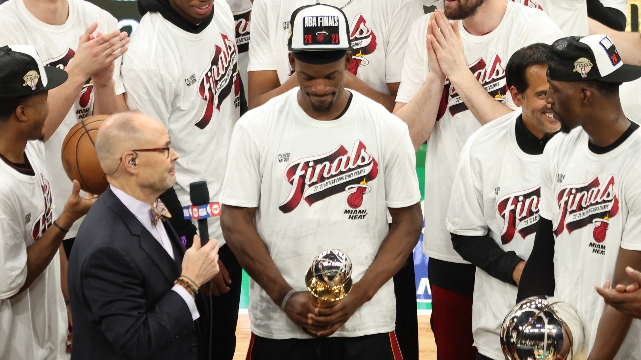 BOSTON, MASSACHUSETTS - MAY 29: Jimmy Butler #22 of the Miami Heat holds the Larry Bird Trophy after Butler was named the Eastern Conference Finals MVP after defeating the Boston Celtics 103-84 in game seven of the Eastern Conference Finals at TD Garden on May 29, 2023 in Boston, Massachusetts. NOTE TO USER: User expressly acknowledges and agrees that, by downloading and or using this photograph, User is consenting to the terms and conditions of the Getty Images License Agreement. Adam Glanzman/Getty Images/AFP (Photo by Adam Glanzman / GETTY IMAGES NORTH AMERICA / Getty Images via AFP)