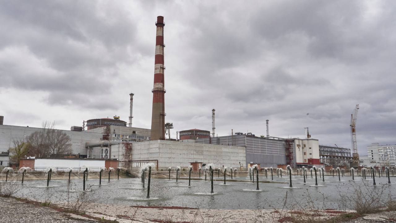 (FILES) A general view of the Russian-controlled Zaporizhzhia nuclear power plant in southern Ukraine on March 29, 2023. Ukraine's occupied Zaporizhzhia nuclear plant has been cut off from the power grid again, its Russian administrators and the Ukrainian atomic agency said on May 22, 2023, a potentially dangerous incident that has become more frequent due to shelling. (Photo by Andrey BORODULIN / AFP)
