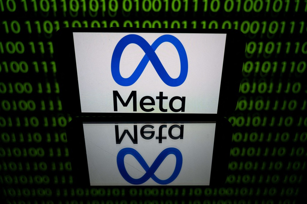 (FILES) In this file photo taken on January 12, 2023 in Toulouse, southwestern France, shows a tablet displaying the logo of the company Meta. Facebook owner Meta has been fined a record 1.2 billion euros ($1.3 billion) for transferring EU user data to the United States in breach of a previous court ruling, Ireland's regulator announced May 23, 2023. The Irish Data Protection Commission, which acts on behalf of the European Union, said the European Data Protection Board had ordered it to collect "an administrative fine in the amount of 1.2 billion euros". Meta said it would appeal the decision. (Photo by Lionel BONAVENTURE / AFP)