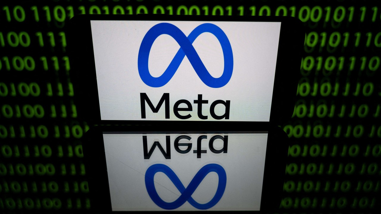 (FILES) In this file photo taken on January 12, 2023 in Toulouse, southwestern France, shows a tablet displaying the logo of the company Meta. Facebook owner Meta has been fined a record 1.2 billion euros ($1.3 billion) for transferring EU user data to the United States in breach of a previous court ruling, Ireland's regulator announced May 23, 2023. The Irish Data Protection Commission, which acts on behalf of the European Union, said the European Data Protection Board had ordered it to collect "an administrative fine in the amount of 1.2 billion euros". Meta said it would appeal the decision. (Photo by Lionel BONAVENTURE / AFP)