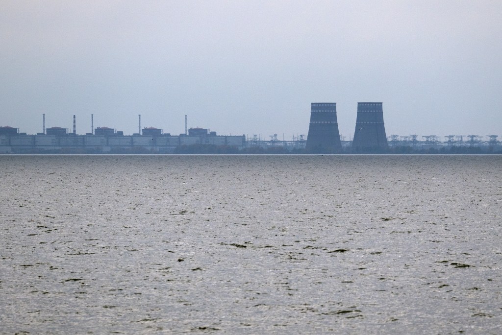 PRYDNIPROVSKE, UKRAINE - OCTOBER 29: Zaporizhzhia Nuclear Power Plant, Europe's largest nuclear power station and currently held by Russian occupying forces, is pictured on October 29, 2022 from Prydniprovske in Dnipropetrovsk oblast, Ukraine. Ukrainian forces have reportedly carried out a large-scale drone attack on Russia's Black Sea Fleet in the Crimean port city of Sevastopol according to Russian officials. Russia has accused British troops of involvement in the attack, the allegation has been denied by Britain's Ministry of Defence. (Photo by Carl Court/Getty Images)