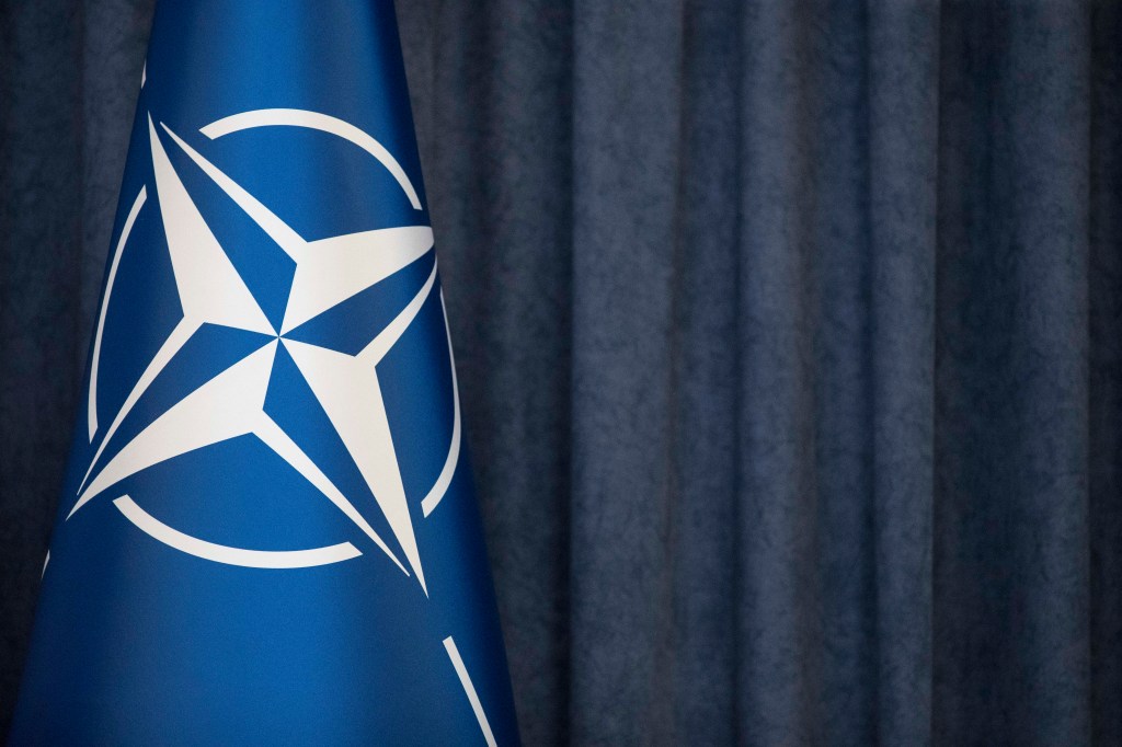 NATO flag seen in Warsaw on 16 November, 2022. (Photo by Maciej Luczniewski/NurPhoto via Getty Images)