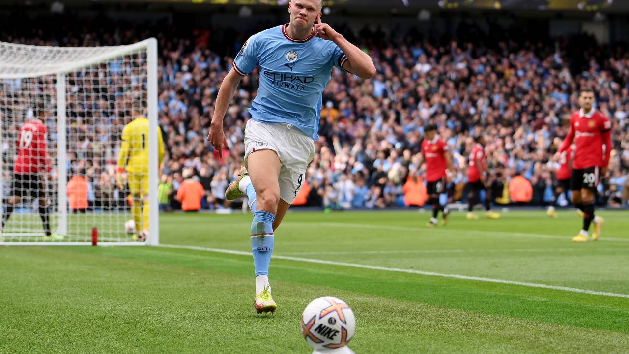 MANCHESTER, ENGLAND - OCTOBER 02: Erling Haaland of Manchester City celebrates their sides third goal during the Premier League match between Manchester City and Manchester United at Etihad Stadium on October 02, 2022 in Manchester, England. (Photo by Laurence Griffiths/Getty Images)