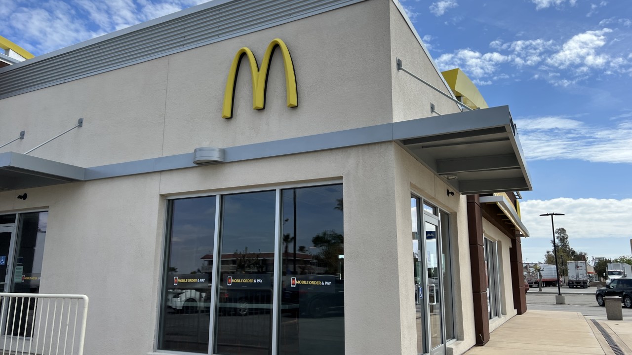 McDonald's facade with Mobile Order & Pay signage under a cloudy sky, Buttonwillow, California, April 7, 2023. (Photo by Smith Collection/Gado/Getty Images)