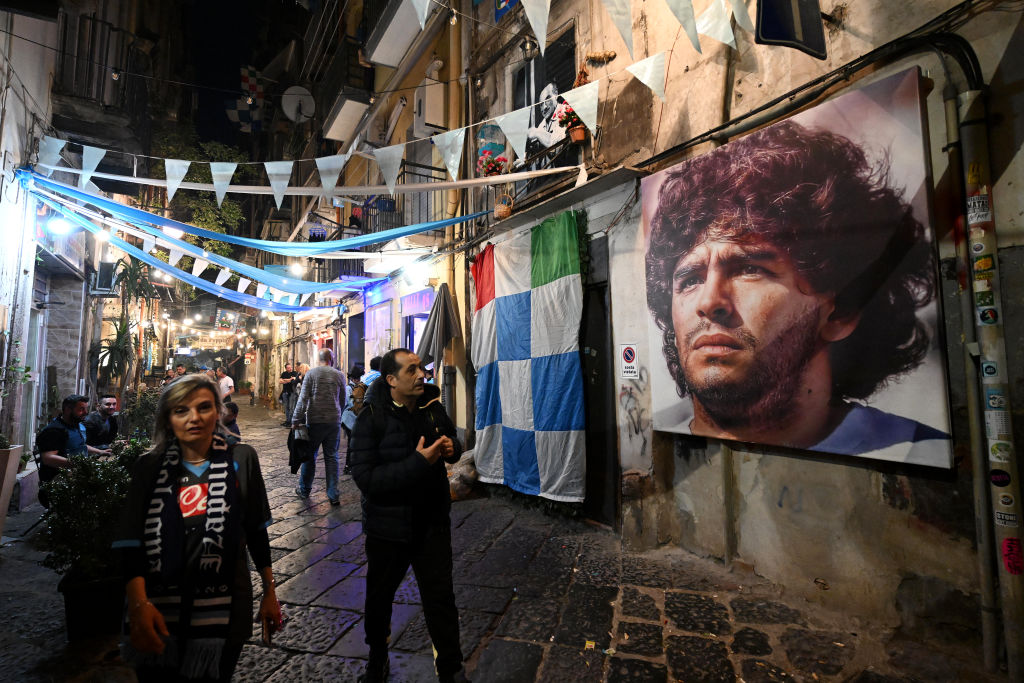 NAPLES, ITALY - MAY 04: A mural of Diego Maradona is seen in the city centre as fans of SSC Napoli celebrate their side winning the Serie A title after their side's draw in the Serie A match between Udinese Calcio and SSC Napoli on May 04, 2023 in Naples, Italy. (Photo by Francesco Pecoraro/Getty Images)