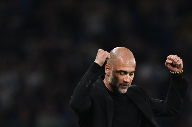 Manchester City's Spanish manager Pep Guardiola celebrates winning the UEFA Champions League final football match between Inter Milan and Manchester City at the Ataturk Olympic Stadium in Istanbul, on June 10, 2023. Manchester City won the match 1-0. (Photo by Paul ELLIS / AFP)
