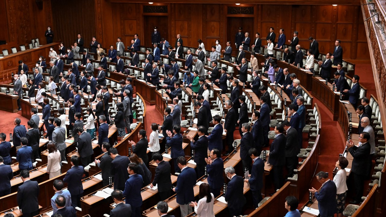 Members of the House of Councilors vote on a bill to revise the Penal Code in line with the reality of sex crimes at the plenary session of the House of Councillors in Tokyo on June 16, 2023. (Photo by Kazuhiro NOGI / AFP)