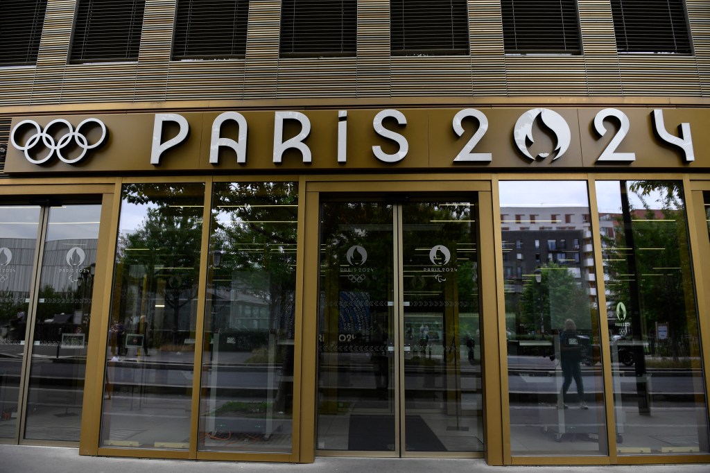 This photograph shows the entrance of the headquarters of the Paris 2024 Olympics (Cojo) headquarters as Police raided just over a year out from the opening ceremony of the quadrennial sporting showpiece, in Saint-Denis, northern Paris, on June 20, 2023. (Photo by JULIEN DE ROSA / AFP)