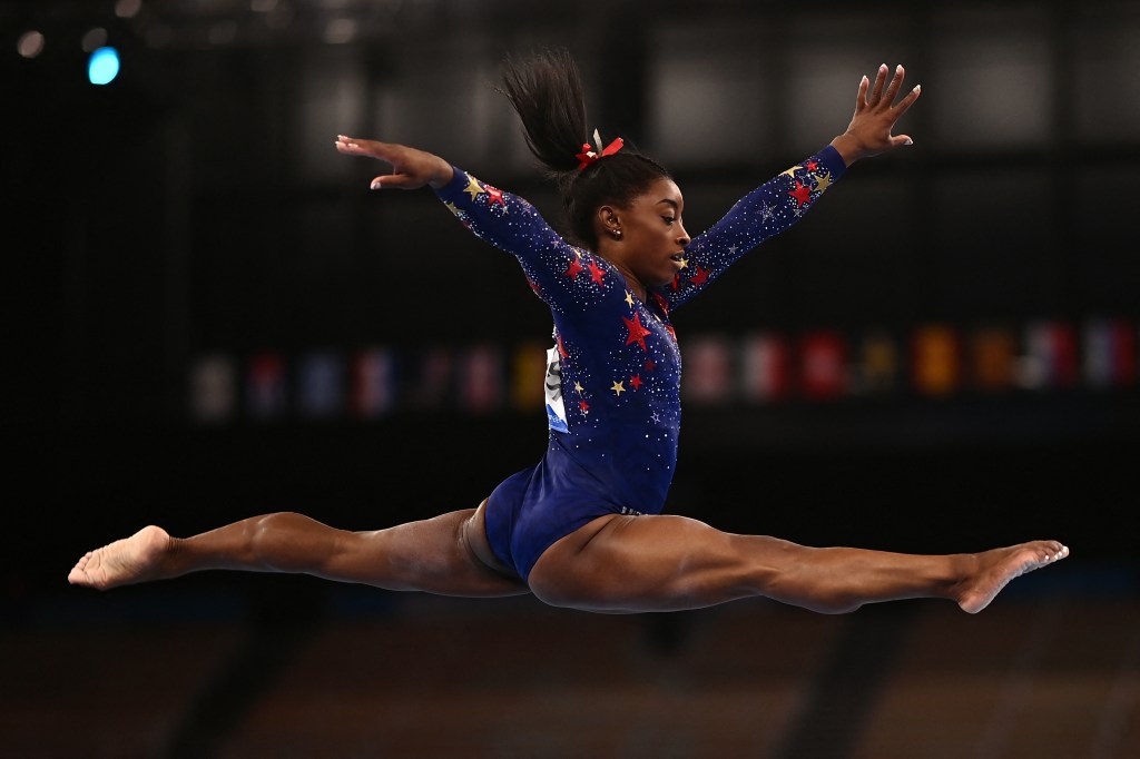 (FILES) US' Simone Biles competes in the artistic gymnastics balance beam event of the women's qualification during the Tokyo 2020 Olympic Games at the Ariake Gymnastics Centre in Tokyo on July 25, 2021. US gymnastics star Simone Biles is set to make her first competitive appearance since the Tokyo Olympics after entering the US Classic, USA Gymnastics announced on June 28, 2023. (Photo by Loic VENANCE / AFP)