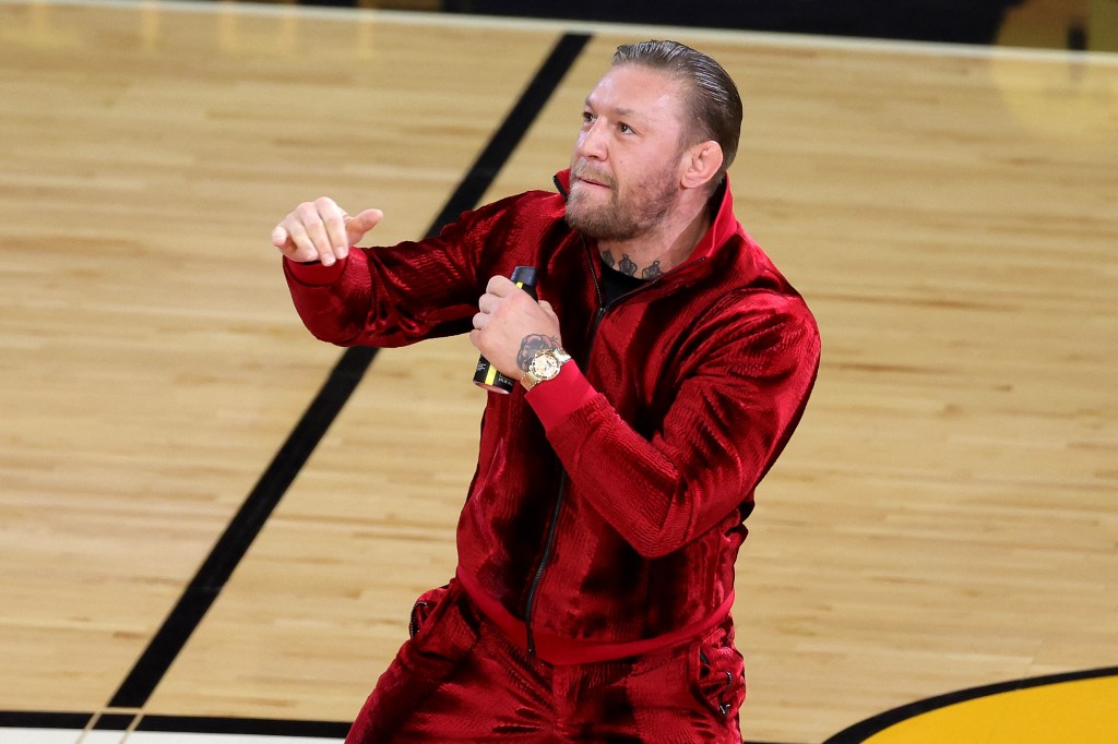 MIAMI, FLORIDA - JUNE 09: Conor McGregor is seen on the court during a timeout in Game Four of the 2023 NBA Finals between the Denver Nuggets and the Miami Heat at Kaseya Center on June 09, 2023 in Miami, Florida. NOTE TO USER: User expressly acknowledges and agrees that, by downloading and or using this photograph, User is consenting to the terms and conditions of the Getty Images License Agreement. Megan Briggs/Getty Images/AFP (Photo by Megan Briggs / GETTY IMAGES NORTH AMERICA / Getty Images via AFP)
