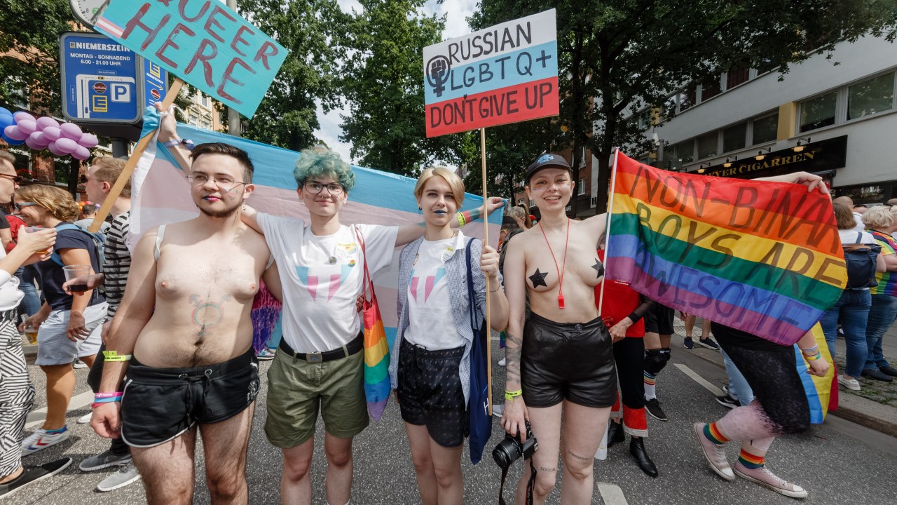 03 August 2019, Hamburg: LGBTQ activists from St.Petersburg, Russia, take part in the Christopher Street Day (CSD) parade. The Pride Week takes place this year under the motto "Basically the same - for a better constitution". Photo: Markus Scholz/dpa (Photo by Markus Scholz/picture alliance via Getty Images)