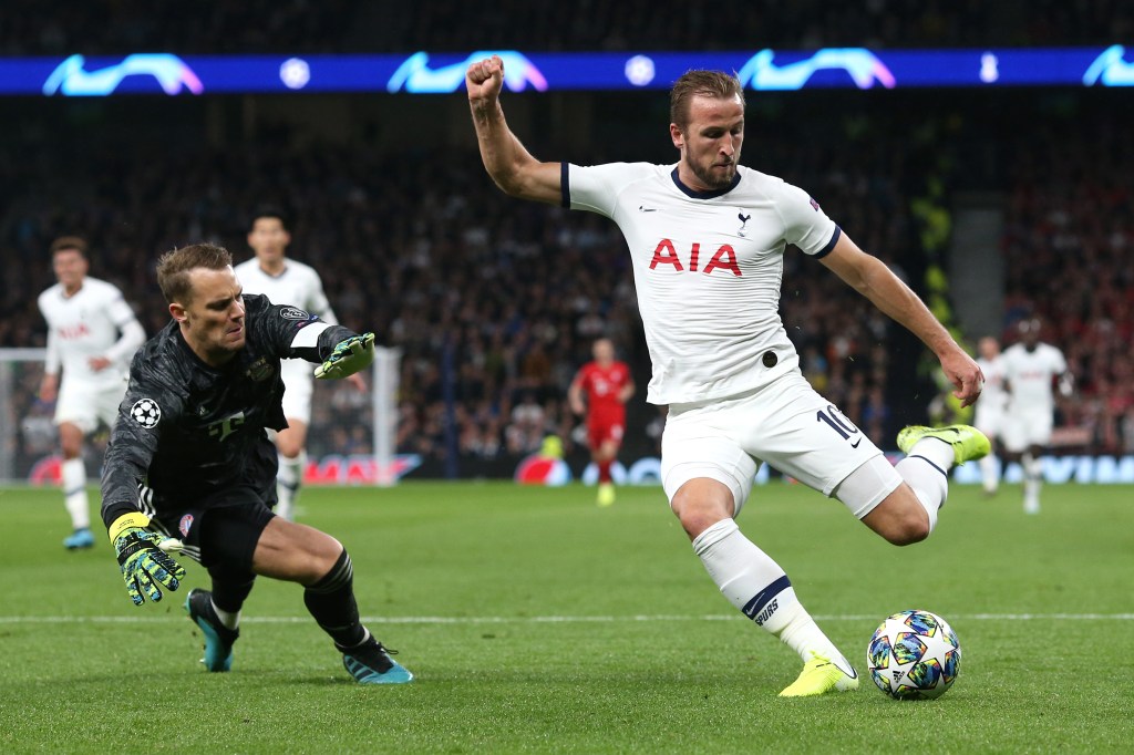 LONDON, ENGLAND - OCTOBER 01: Harry Kane of Tottenham shoots round Bayern goalkeeper Manuel Neuer but misses during the UEFA Champions League group B match between Tottenham Hotspur and Bayern Muenchen at Tottenham Hotspur Stadium on October 1, 2019 in London, United Kingdom. (Photo by Charlotte Wilson/Offside/Offside via Getty Images)