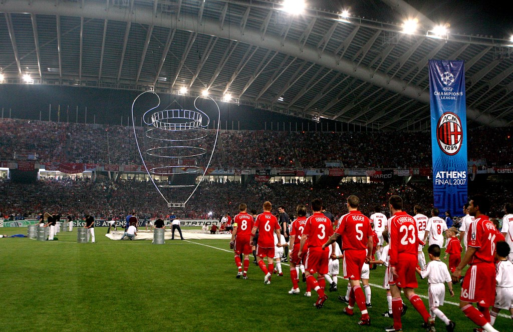 Liverpool and AC Milan players make their way onto the pitch (Photo by Adam Davy - PA Images via Getty Images)