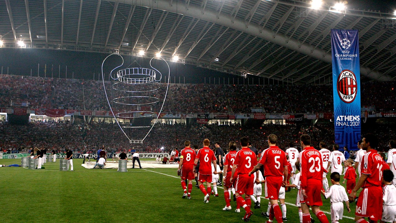Liverpool and AC Milan players make their way onto the pitch (Photo by Adam Davy - PA Images via Getty Images)