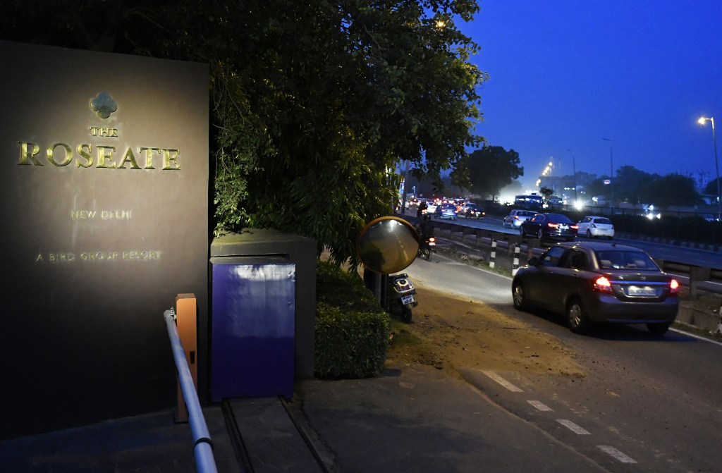 Traffic passes outside the Roseate New Delhi hotel, operated by the Bird Group, at night in New Delhi, India, on Saturday, Aug. 19, 2017. The Roseate on the Delhi-Jaipur Expressway was among hundreds of establishments subject to a Supreme Court order banning the sale of alcohol from within 500 meters, or a third of a mile, from a highway. The prohibition, implemented on April 1 to curb drunken driving, was partially lifted by the countrys top court Wednesday, alleviating a five-month slide in business for Indias liquor and hospitality firms. Photographer: Anindito Mukherjee/Bloomberg via Getty Images