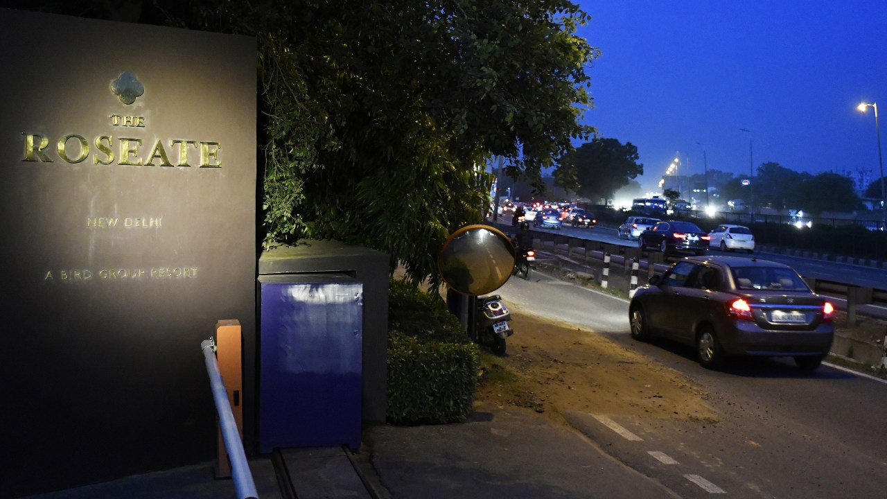 Traffic passes outside the Roseate New Delhi hotel, operated by the Bird Group, at night in New Delhi, India, on Saturday, Aug. 19, 2017. The Roseate on the Delhi-Jaipur Expressway was among hundreds of establishments subject to a Supreme Court order banning the sale of alcohol from within 500 meters, or a third of a mile, from a highway. The prohibition, implemented on April 1 to curb drunken driving, was partially lifted by the countrys top court Wednesday, alleviating a five-month slide in business for Indias liquor and hospitality firms. Photographer: Anindito Mukherjee/Bloomberg via Getty Images