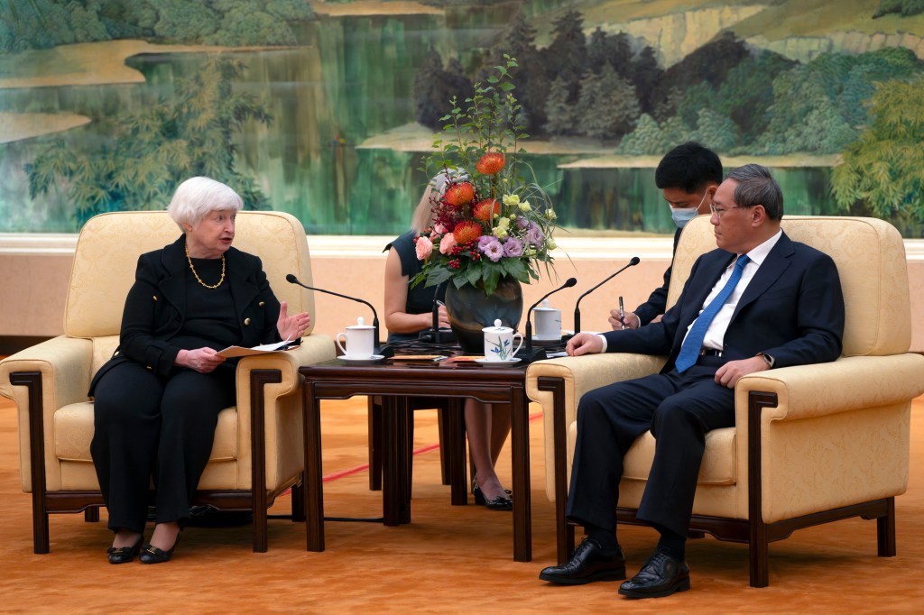 Chinese Premier Li Qiang (R) speaks with US Treasury Secretary Janet Yellen during a meeting at the Great Hall of the People in Beijing on July 7, 2023. (Photo by Mark Schiefelbein / POOL / AFP)
