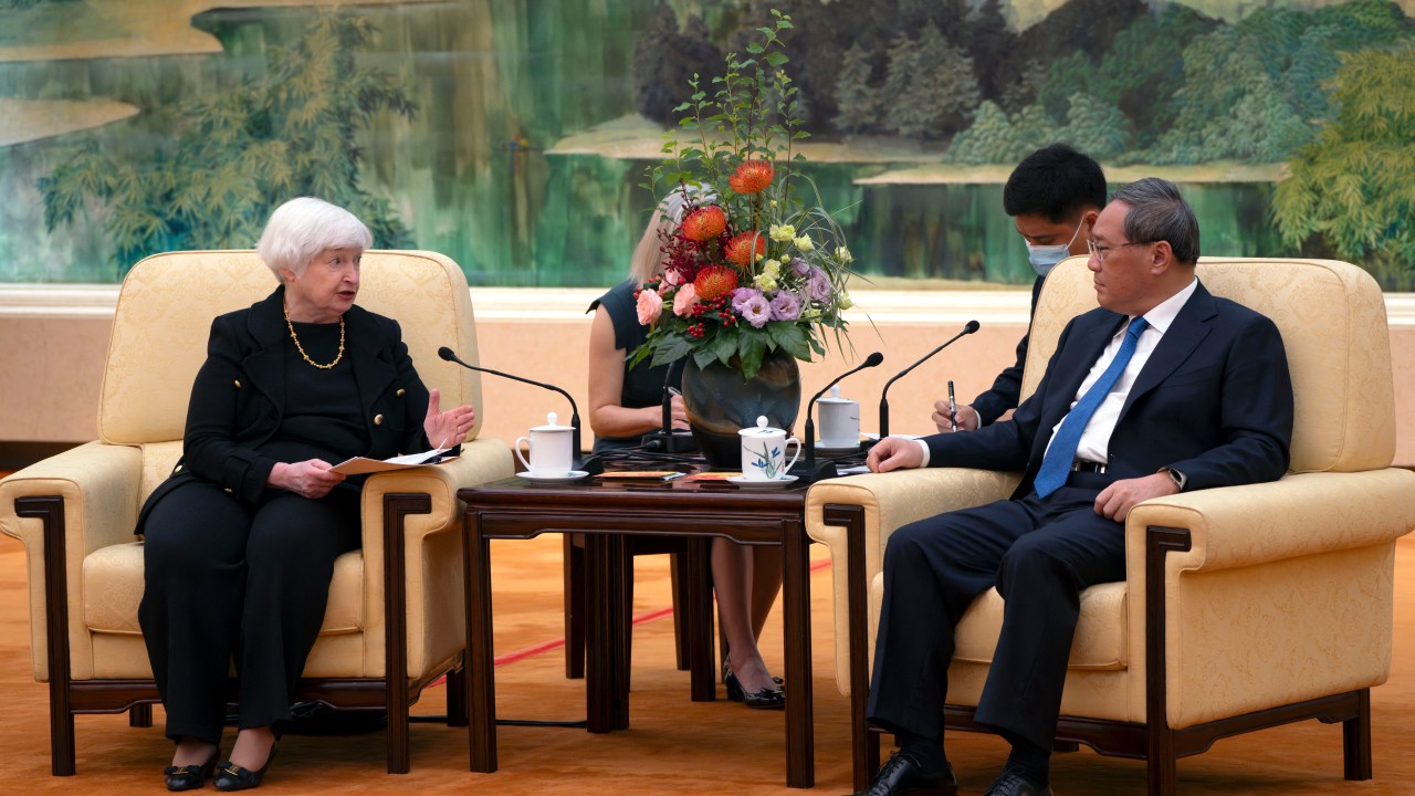 Chinese Premier Li Qiang (R) speaks with US Treasury Secretary Janet Yellen during a meeting at the Great Hall of the People in Beijing on July 7, 2023. (Photo by Mark Schiefelbein / POOL / AFP)