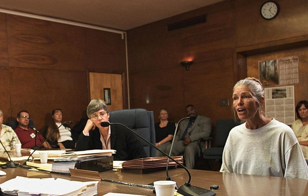 (FILES) Leslie Van Houten, a former follower of Charles Manson, listens as former Deputy District Attorney Stephen Kay (not pictured) describes the 1969 killing scene of the Smaldino couple during a parole hearing June 28, 2002 at the California Institution for Women in Corona, California. Leslie Van Houten, a disciple of notorious serial killer Charles Manson, was released from prison on July 11, 2023 after more than five decades, California prison authorities said. (Photo by DAMIAN DOVARGANES / AP / AFP)