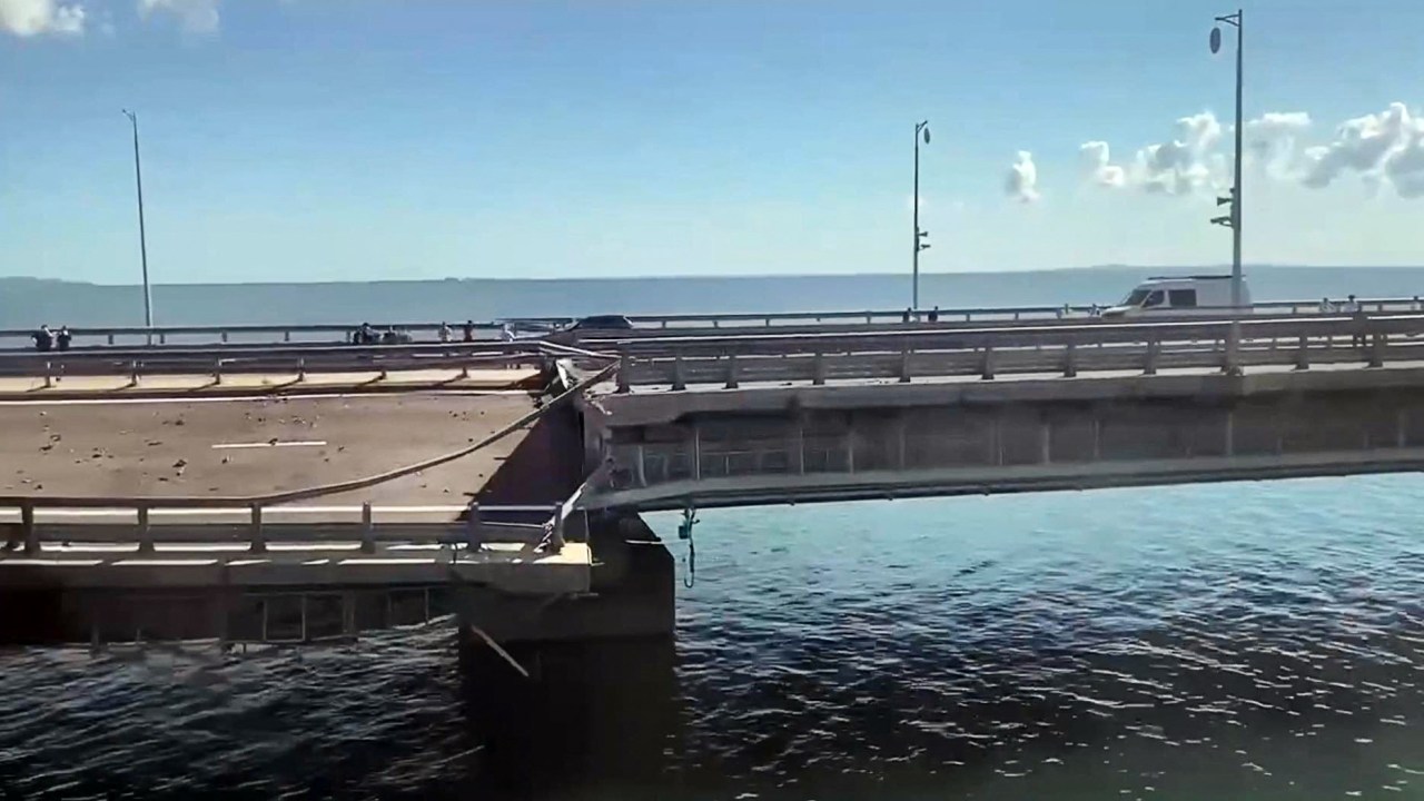 This video grab taken from a ?rimea24TV footage on July 17, 2023 shows the damaged Kerch bridge -- linking Crimea to Russia -- which was heavily damaged following an attack. Russia on July 17, 2023, said a Ukrainian attack on the bridge linking Moscow-annexed Crimea to the Russian mainland killed a civilian couple and wounded their child. Moscow said two drones had hit the bridge in the early hours and blamed "the Kyiv regime." (Photo by Crimea24TV / AFP)
