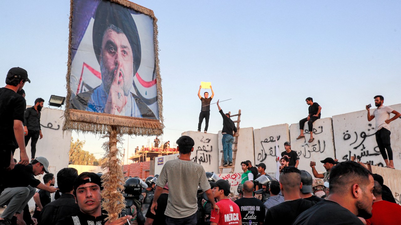 Supporters of Iraqi Shiite cleric Moqtada al-Sadr gather for a protest outside the Swedish embassy in Baghdad on July 20, 2023. Protesters set fire to Sweden's embassy in the Iraqi capital early on July 20 ahead of a planned burning of a Koran in Sweden. Swedish authorities approved an assembly to be held later on July 20 outside the Iraqi embassy in Stockholm, where organisers plan to burn a copy of the Koran as well as an Iraqi flag. (Photo by Ahmad AL-RUBAYE / AFP)