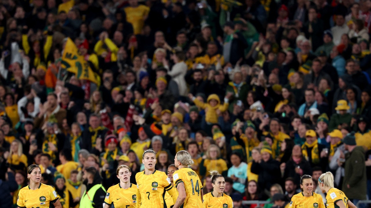 Australia's defender #07 Stephanie Catley (3rd L) reacts after celebrating a goal during the Australia and New Zealand 2023 Women's World Cup Group B football match between Australia and Ireland at Stadium Australia, also known as Olympic Stadium, in Sydney on July 20, 2023. (Photo by DAVID GRAY / AFP)