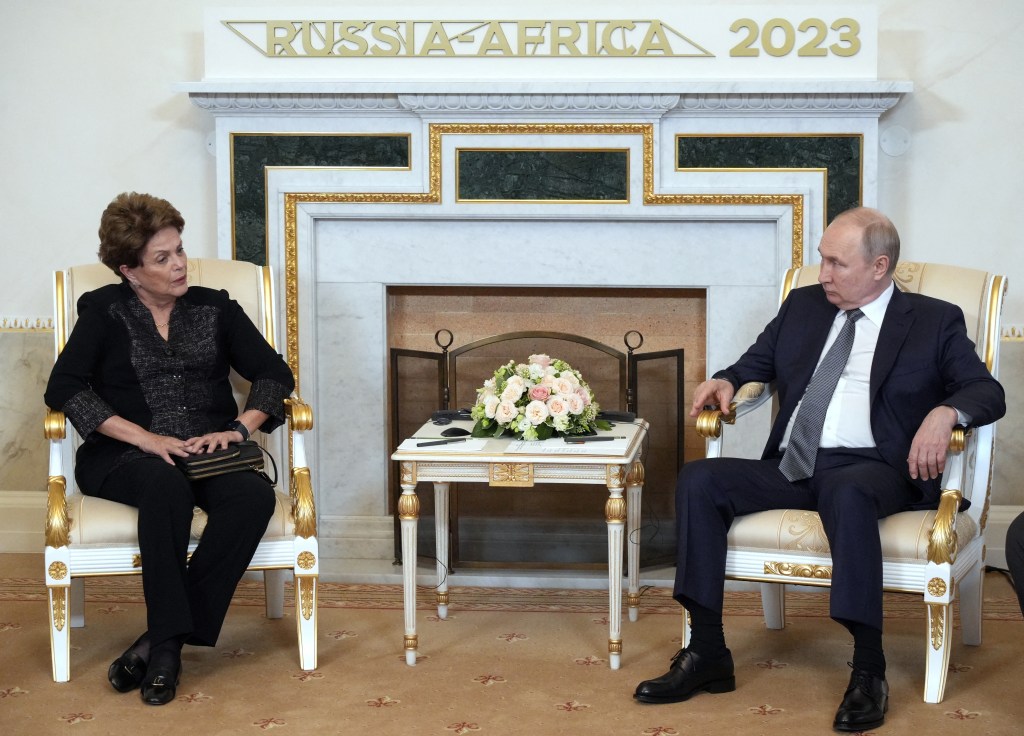 Russian President Vladimir Putin meets with Dilma Rousseff, Chair of the New Development Bank, in Strel'na, outside Saint Petersburg, on July 26, 2023, ahead of the second Russia-Africa summit. (Photo by Alexey DANICHEV / SPUTNIK / AFP)
