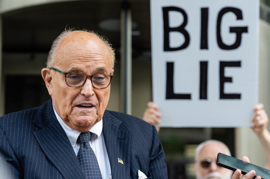 Rudy Giuliani, former lawyer to Donald Trump, speaks to members of the media as he leaves federal court in Washington, DC, US, on Friday, May 19, 2023. Giuliani is facing allegations that he's violated his discovery obligations in a civil suit brought by two Georgia election workers who accused him of defaming them after the 2020 election. Photographer: Eric Lee/Bloomberg via Getty Images