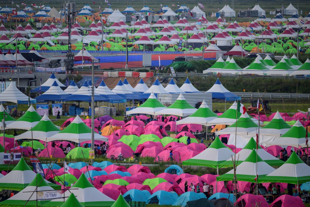 A general view shows the campsite of the World Scout Jamboree in Buan, North Jeolla province on August 5, 2023. American and British scouts pulled out of the World Scout Jamboree in South Korea, citing scorching temperatures, as organisers weighed whether to cut short an event also reportedly plagued by dire campsite conditions. (Photo by ANTHONY WALLACE / AFP)